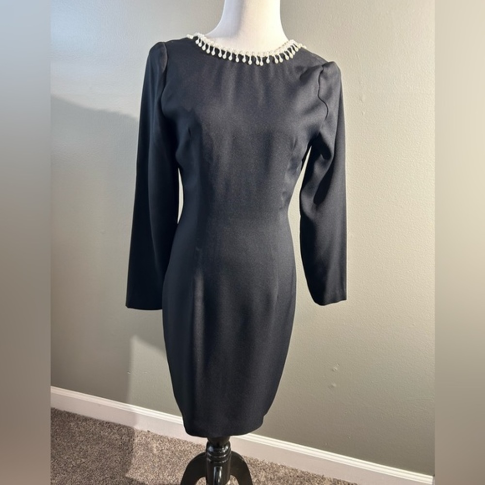 Depeche Mode size for black dress‎ with pearl accent at neck